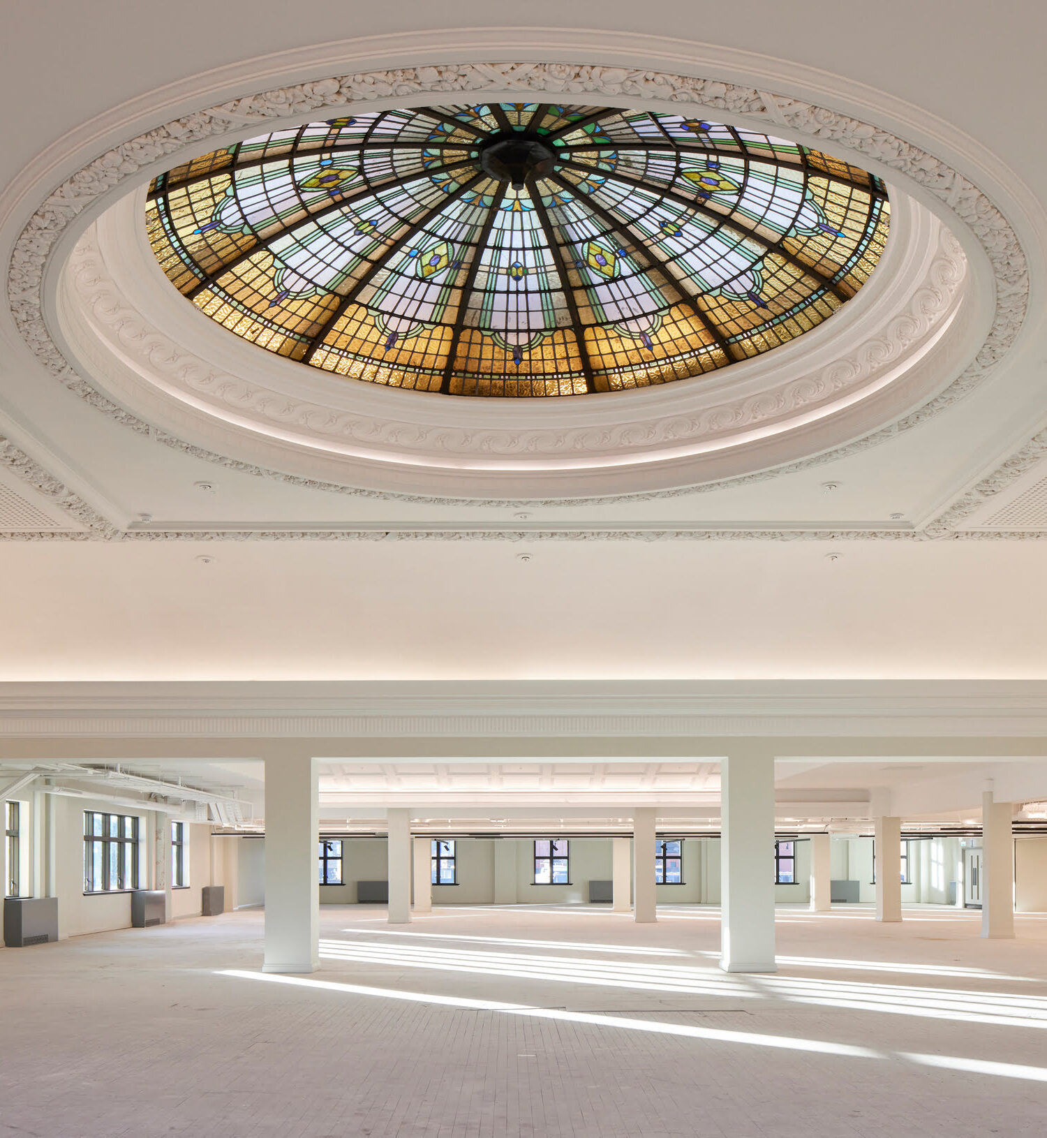 Restored historic plaster ceiling dome with ornate decorative mouldings, expertly conserved on site by Fine Art Mouldings using traditional restoration techniques